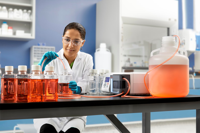 Scientist using Nalgene bottles