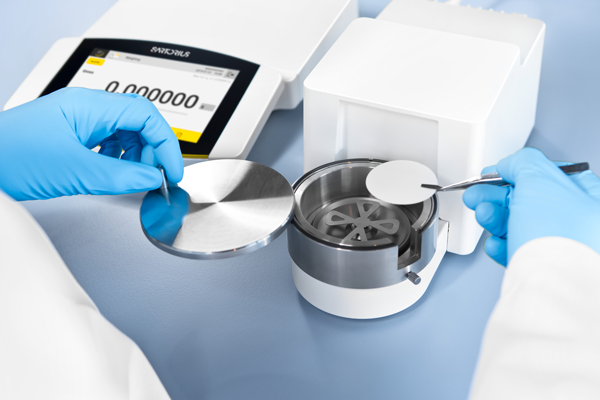 Scientist Using the Sartorius Cubis™ II Micro Balance